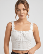Elowen Top by Lauven — white women’s eyelet embroidery crop top with ruffle straps and bow front sleeveless summer cami