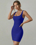 Indigo Mini Dress by Lauven, featuring a body-hugging silhouette and vibrant blue ribbed knit fabric.