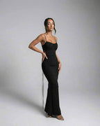 Isla Maxi Dress by Lauven, black sleeveless sheath dress with spaghetti straps and V-neckline.