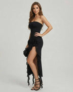 Isla Maxi Dress by Lauven, elegant black strapless gown with ruffles and an asymmetrical hemline.