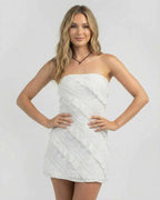 Isla Mini Dress by Lauven, elegant strapless sheath dress with diagonal ruffle design in white.