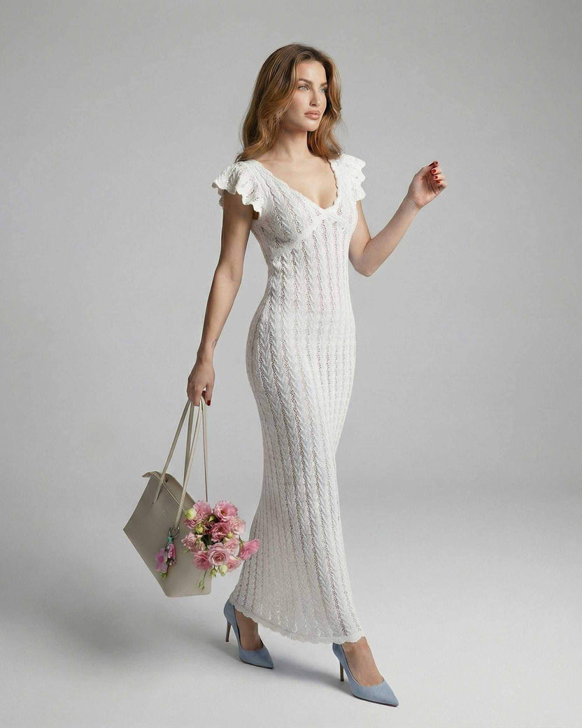 Ivory Lace Maxi dress by Lauven, featuring a V-neckline and ruffle sleeves in a textured white lace design.