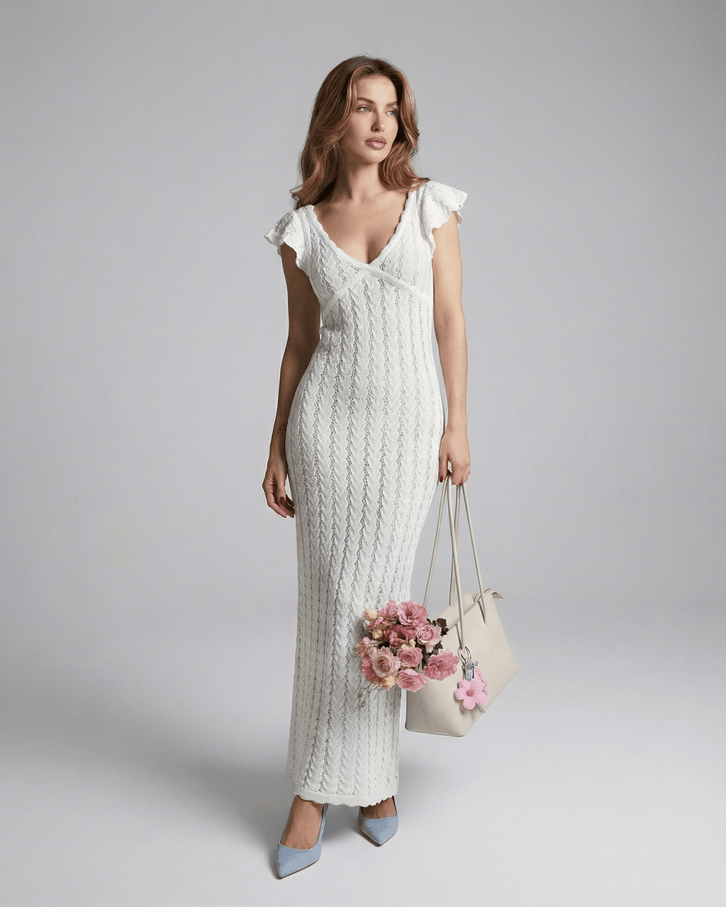 Ivory Lace Maxi dress by Lauven, featuring a V-neckline, ruffle sleeves, and intricate lace detailing.