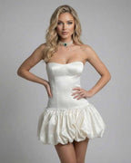 Ivory Mini Dress by Lauven – Strapless bodycon mini dress featuring a backless design and structured silhouette.