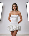 Lauven Ivory Mini Dress featuring a strapless bodycon design and balloon skirt, perfect for elegant occasions.