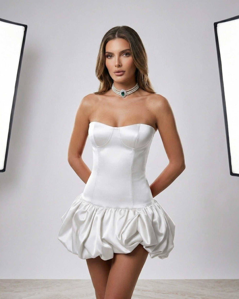 Lauven Ivory Mini Dress featuring a strapless bodycon design and balloon skirt, perfect for elegant occasions.
