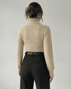 Ivory Sweater by Lauven, showcasing the back view with a structured mock neck and ribbed knit design.
