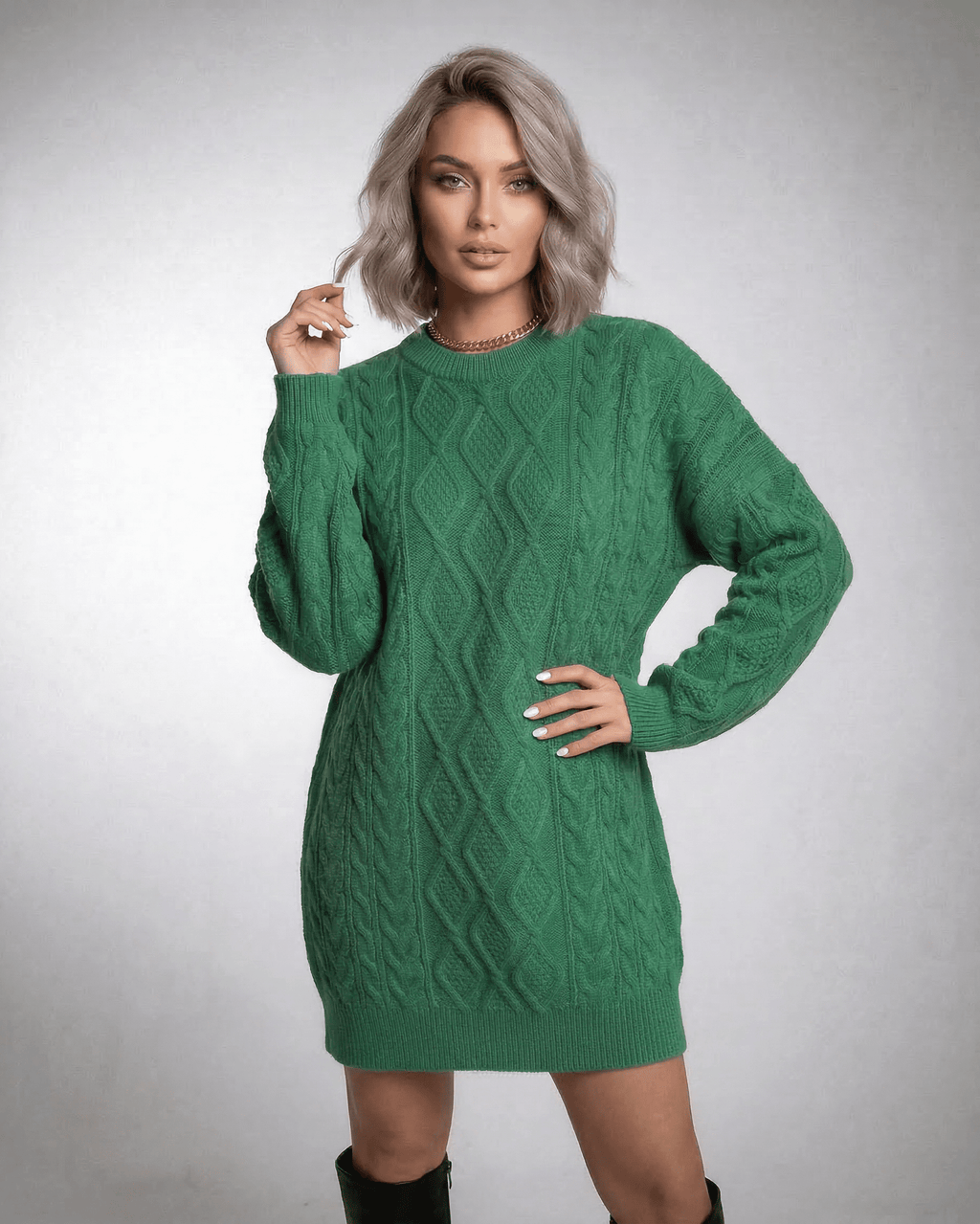Ivy Mini Dress in emerald green cable knit by Lauven, featuring a relaxed fit and dropped long sleeves.