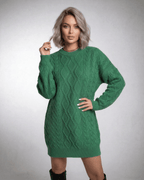Ivy Mini Dress in emerald green cable knit by Lauven, featuring a relaxed fit and dropped long sleeves.