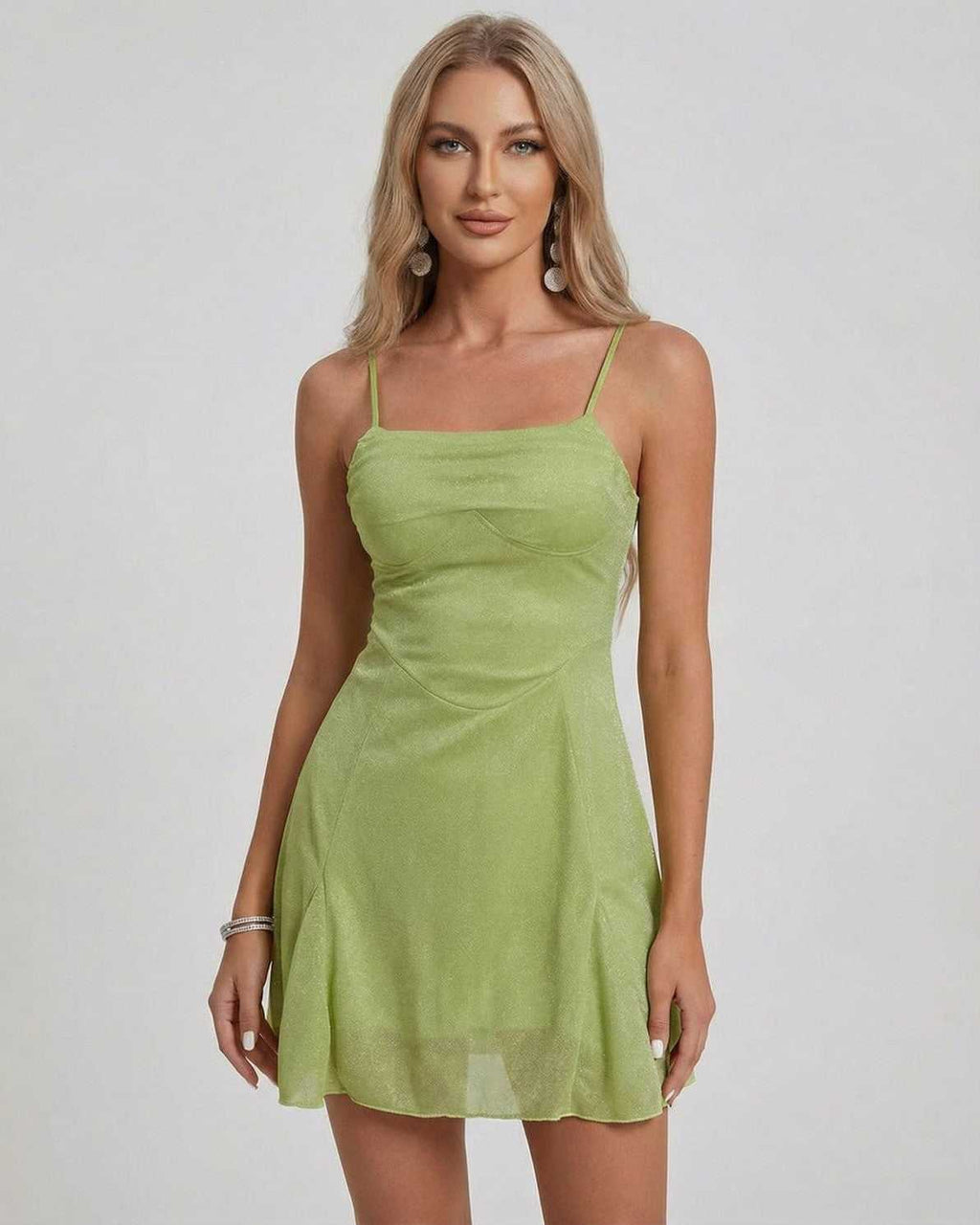 Ivy Mini Dress by Lauven in shimmering green with A-line silhouette and square neckline, ideal for modern sophistication.