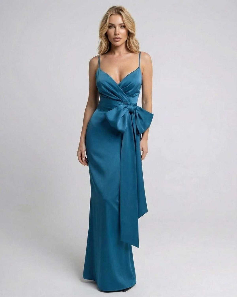 Laguna Maxi Dress by Lauven, asymmetrical sleeveless design with a statement bow in sleek teal fabric.