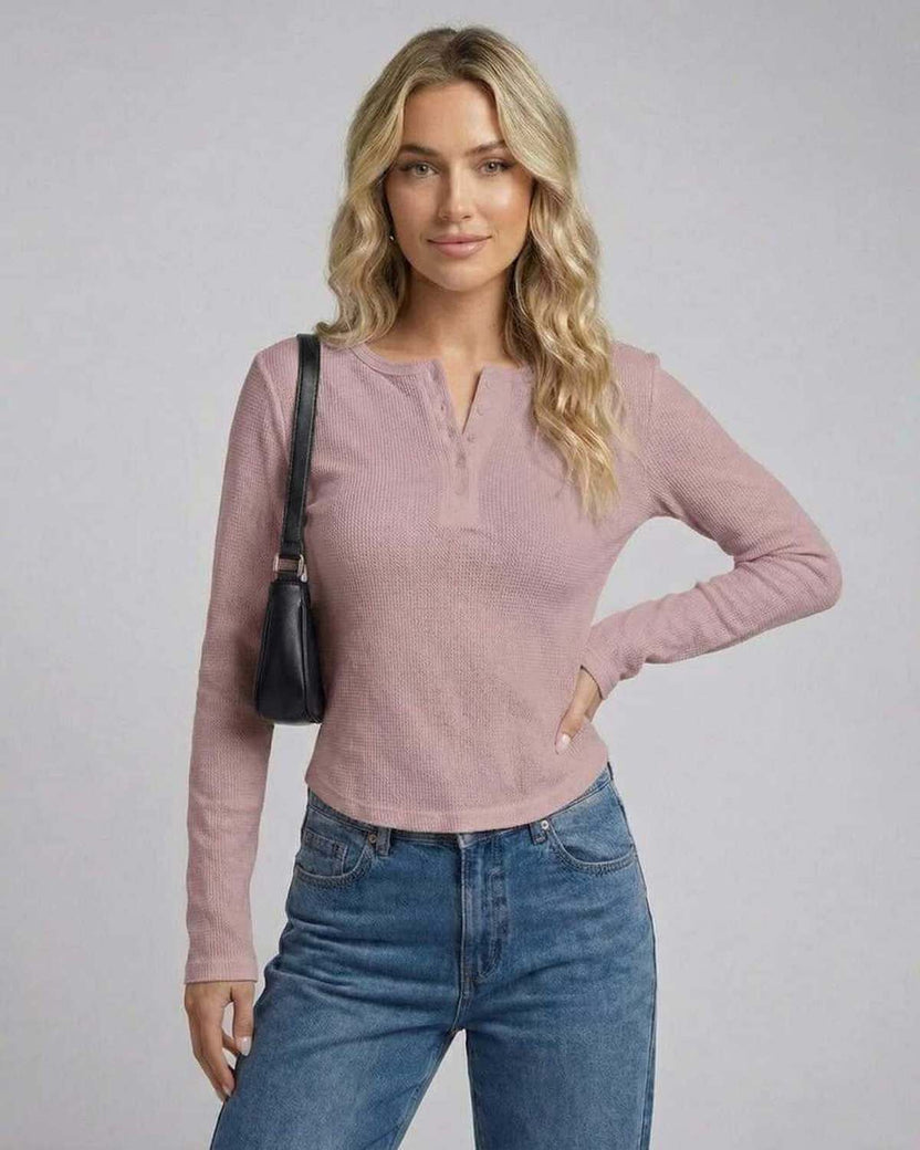 Arden Long Sleeve – Lauven Women’s long sleeve henley top in dusty rose with button placket and casual sophistication.