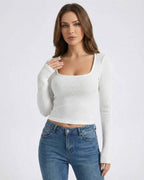 Arden Pullover by Lauven - Women’s White Ribbed U-Neck Long Sleeve Pullover Sweater showcasing a sleek silhouette.