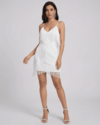 Aurora Mini Dress by Lauven – Fringe V-Neck Sleeveless Mini Dress in white, featuring layered fringe and modern elegance.