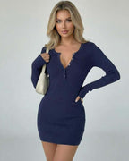 Aurora Mini Dress by Lauven, navy blue bodycon mini dress with deep V-neck and long sleeves.