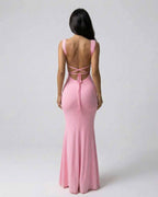 Back view of Lauven Blush Maxi Dress showcasing the sleek design and elegant silhouette in soft pink.