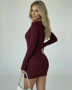 Bordeaux Mini Dress by Lauven, featuring a burgundy bodycon silhouette with long sleeves and a deep V-neck.