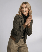 Woman wearing a Lauven Cambridge Jacket, a stylish plaid jacket with lapel collar and long sleeves.