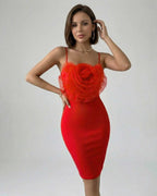 Lauven Camellia Mini Dress in striking red, featuring a strapless design and layered rose detail.