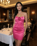 Capri Mini Dress by Lauven in pink satin, featuring strapless design and 3D floral accent.