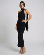 Celeste Maxi Dress by Lauven: Sleek black halter neck evening dress with a modern silhouette.