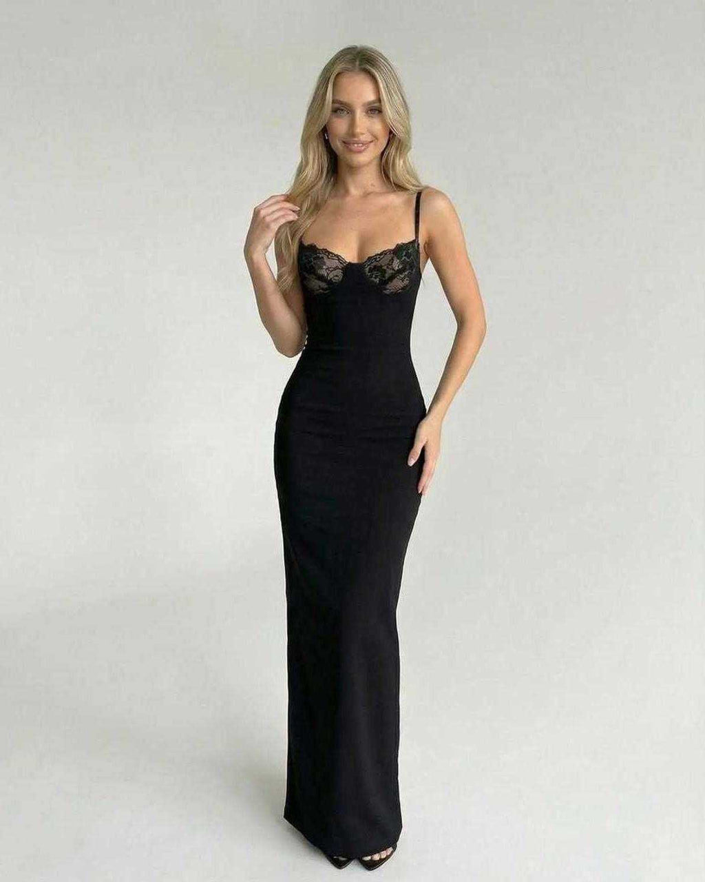 Celeste Maxi Dress by Lauven featuring a lace bodice detail, sophisticated black silhouette for evening wear.
