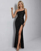 Celeste Maxi Dress by Lauven, elegant one-shoulder black sequin gown with a thigh-high slit and body-hugging fit.