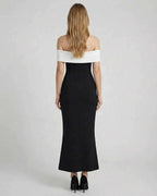Celeste Maxi Dress by Lauven featuring an elegant off-shoulder design in black and white, showcasing a flattering silhouette.