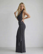 Celeste Maxi Dress by Lauven, showcasing draped neckline and fitted silhouette in dark charcoal.