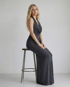 Celeste Maxi Dress by Lauven featuring a draped neckline and fitted silhouette in dark charcoal.