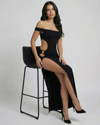 Celeste Maxi Dress by Lauven, elegant black cutout design with thigh-high slit and off-shoulder straps.