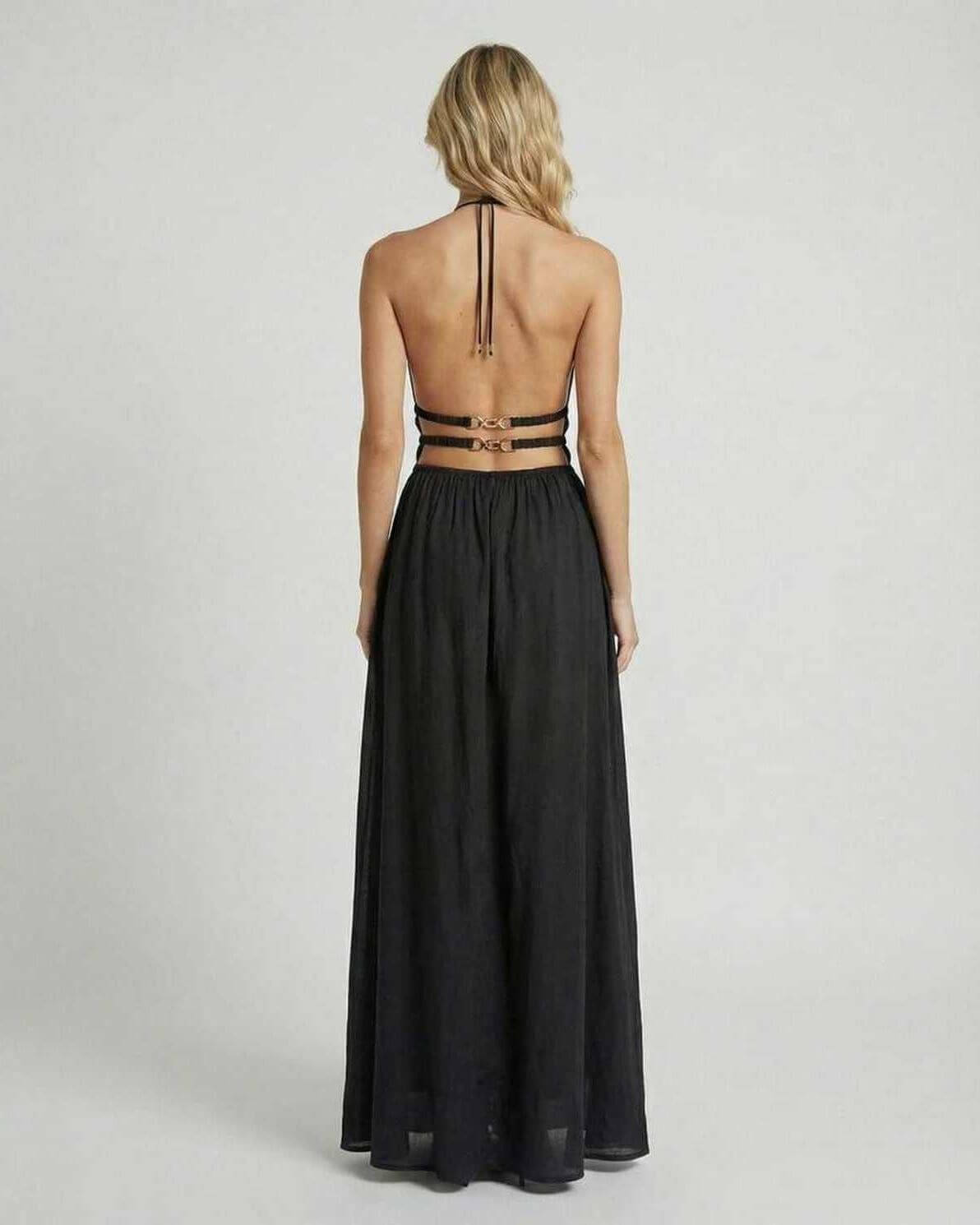 Celeste Maxi Dress by Lauven – Elegant back view showcasing the sleek black silhouette and halter neck design.