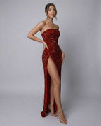 Celeste Maxi Dress by Lauven - Elegant red sequin strapless gown with a high slit and flattering A-line silhouette.