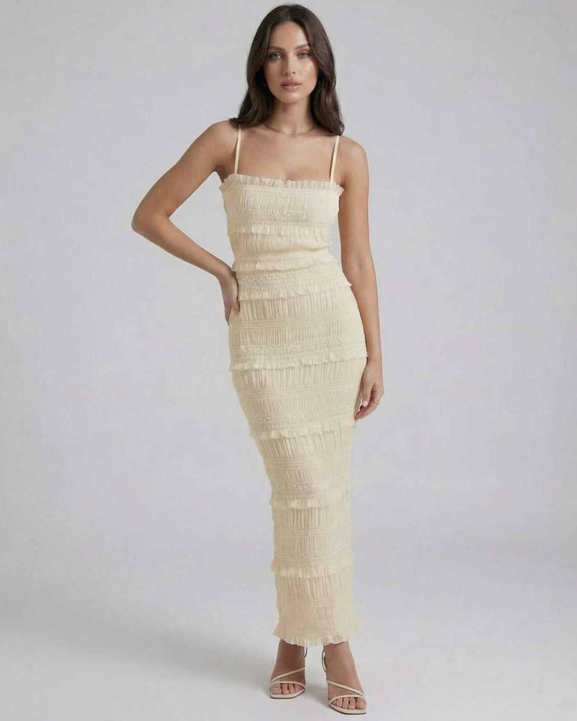 Celeste Maxi Dress by Lauven, elegant ivory dress with spaghetti straps and textured detailing for special occasions.