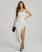 Celeste Maxi Dress by Lauven, elegant strapless white dress with ruffle details and a side slit.