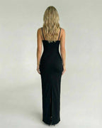 Celeste Maxi Dress by Lauven, showcasing a sleek black silhouette with lace bodice and elegant back view.