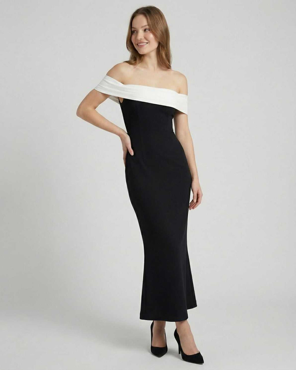 Celeste Maxi Dress by Lauven featuring an elegant off-shoulder silhouette in black and white.