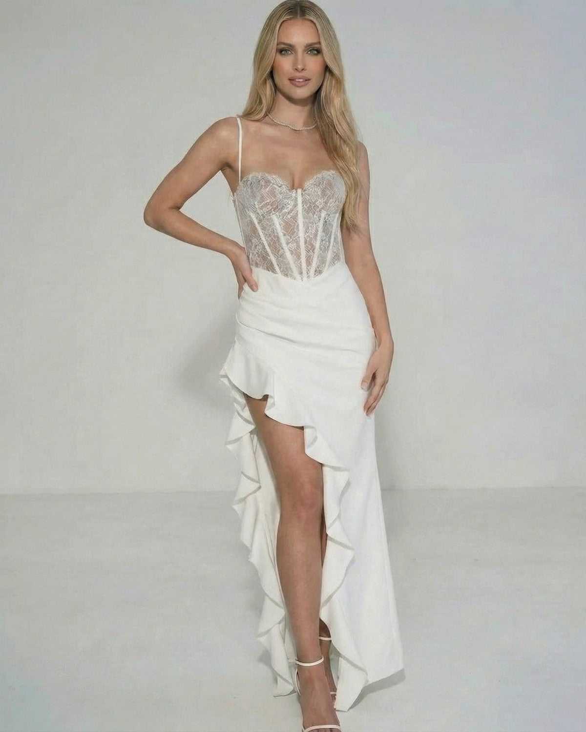 Celeste Maxi Dress by Lauven featuring a sheer lace bodice and ruffled asymmetrical skirt.