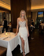 Celeste Maxi Dress by Lauven featuring a sheer lace bodice and ruffled asymmetrical skirt, perfect for evening events.