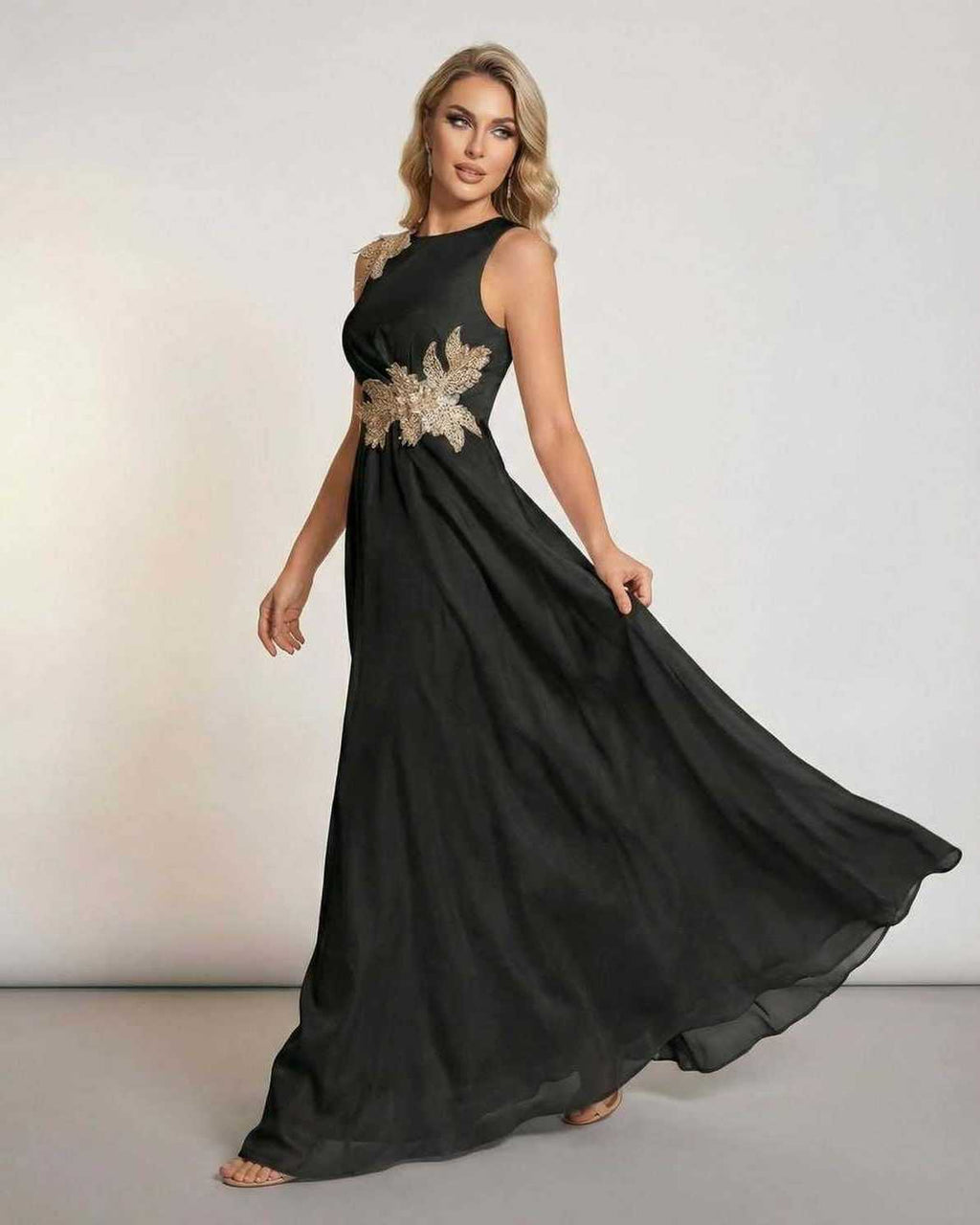 Celeste Maxi Dress by Lauven, elegant sleeveless black dress with patchwork detail and flowing silhouette.