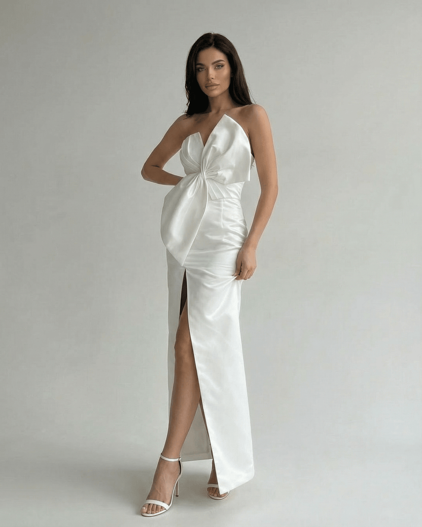 Celeste Maxi Dress by Lauven in white satin, featuring a strapless design and front slit for an elegant style.