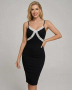 Celeste Midi Dress by Lauven featuring lace detailing, perfect for elegant occasions and stylish events.