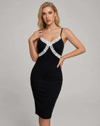 Celeste Midi Dress from Lauven featuring delicate lace detailing for a sophisticated silhouette.