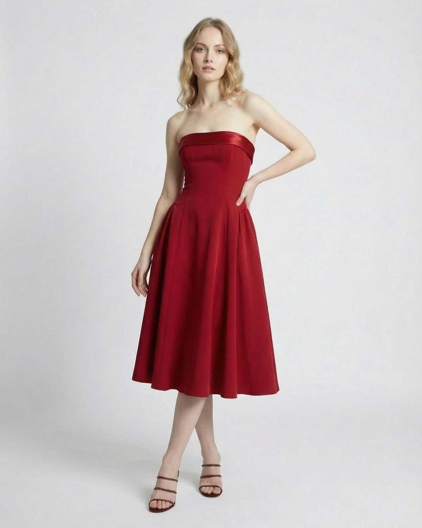 Celeste Midi Dress by Lauven, strapless high-waist silhouette in elegant red with pockets, perfect for special occasions.