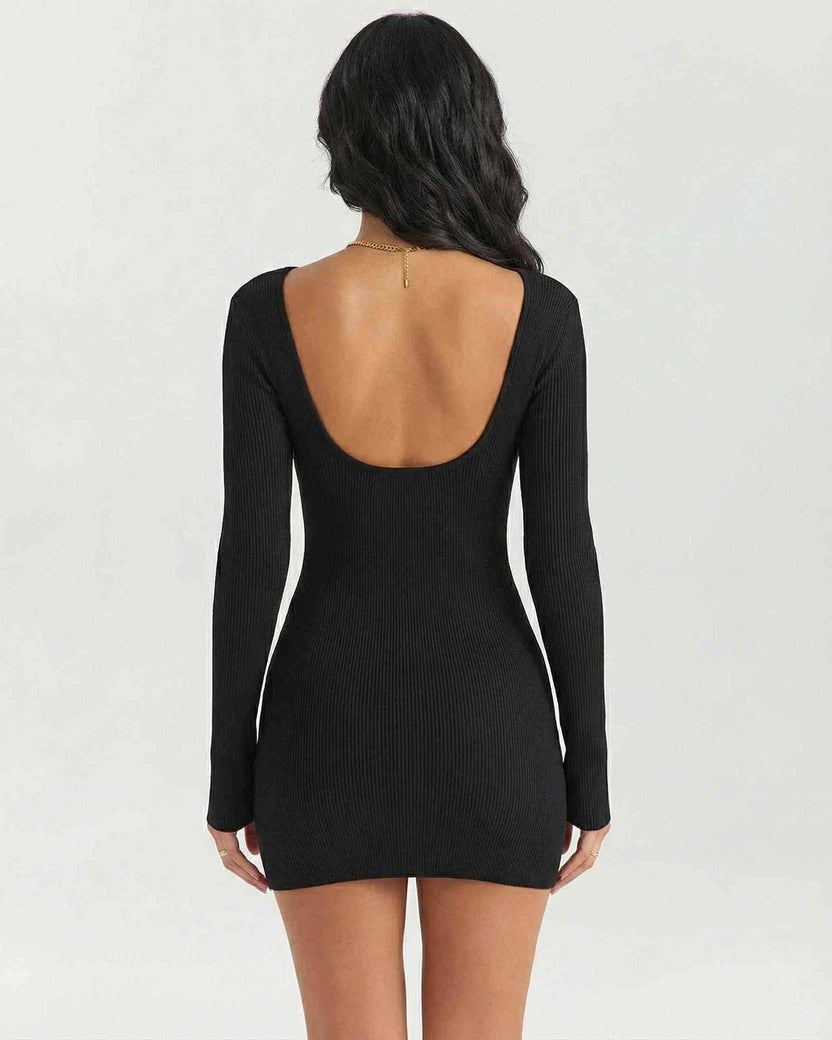 Back view of women’s Celeste Mini Dress by Lauven, featuring a ribbed texture and long sleeves in elegant black.