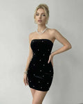 Celeste Mini Dress by Lauven in black velvet with pearl accents, showcasing a strapless silhouette for chic elegance.