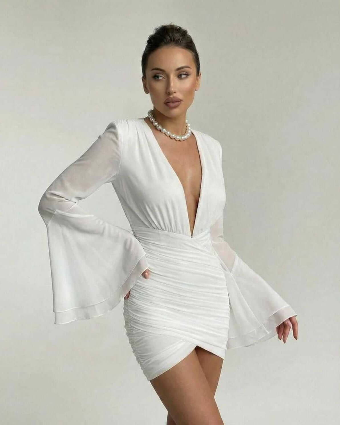 Celeste Mini Dress by Lauven, elegant V-neck sheath with dramatic sleeves in white fabric.