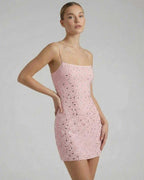 Celeste Mini Dress by Lauven featuring pink fabric with embellished rhinestones, ideal for a stylish look.