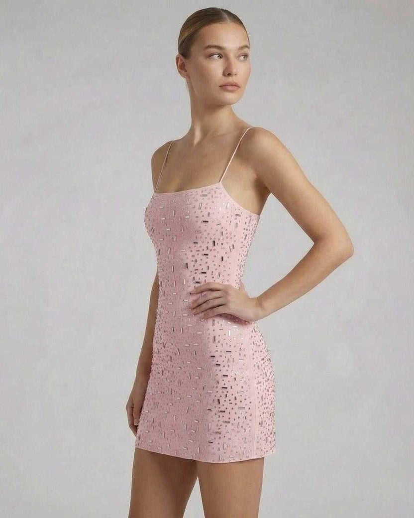 Celeste Mini Dress by Lauven featuring embellished rhinestones on delicate pink fabric.