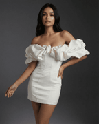 Celeste Mini Dress by Lauven featuring dramatic ruffle trim and boned structure for a sleek look.